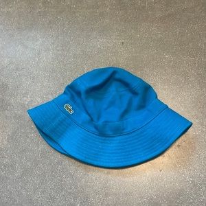 lacoste turquoise bucket hat, size large